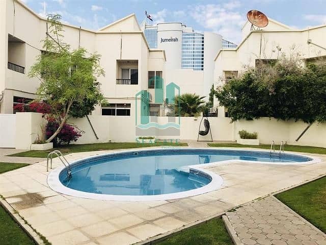 Close to the Beach, Spacious 4 bedroom plus maid villa with private garden and shared  pool in Umm Suqeim 3