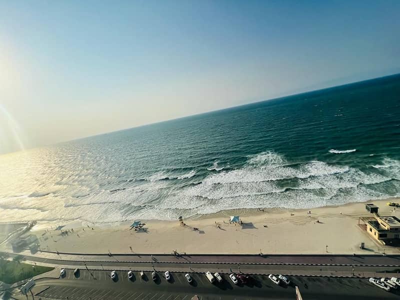 A breath taking view of Ajman coast with a very big rooms - brand new building - Panoramic view