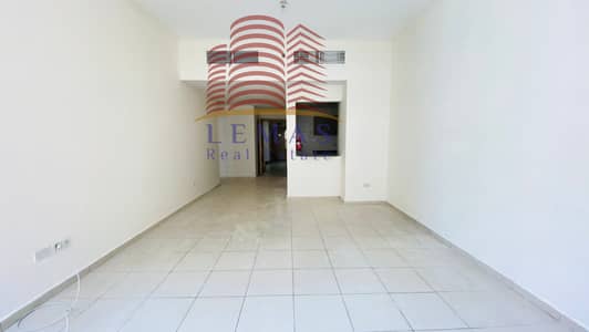 hot offer 2 bhk open kitchen partial city view for rent in Ajman one tower