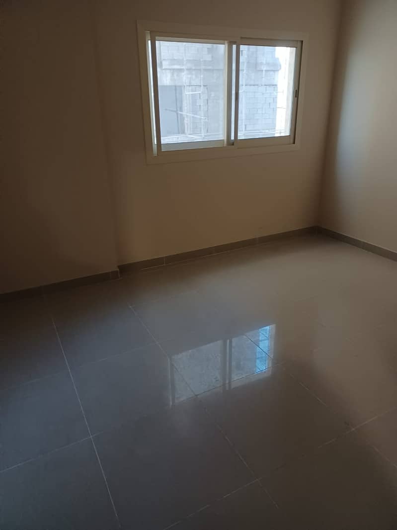 Large studio space with separate kitchen, first inhabitant, central air conditioning for annual rent in Ajman