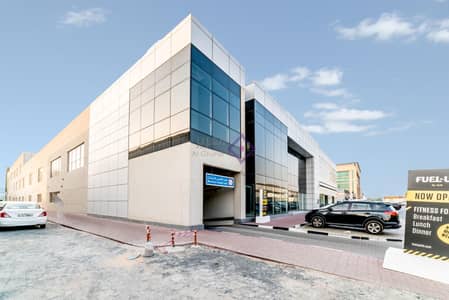 Showroom for Rent in Sheikh Zayed Road, Dubai - Large Showroom near Times Square Center | Al Quoz