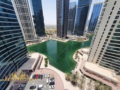 Studio for Rent in Jumeirah Lake Towers (JLT), Dubai - Spacious unit | Near Metro | Unfurnished | With balcony | up to 4 cheques| Chiller Free | Lake view
