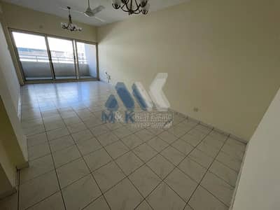 فلیٹ 2 غرفة نوم للايجار في الكرامة، دبي - شقة في بناية عالية الكرامة 2 غرف 60399 درهم - 5609249