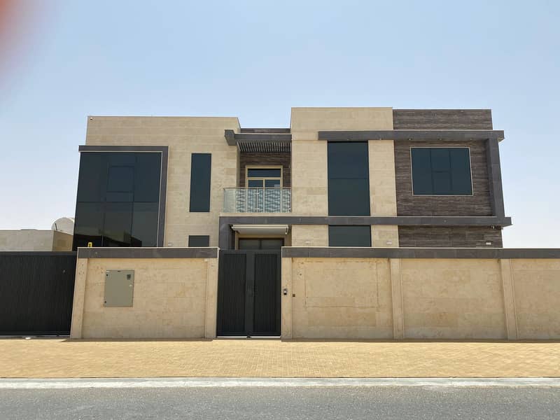 For sale, a new two-storey villa, a stone facade, with a swimming pool