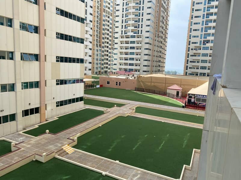 one  bedroom hall apartment for rent with a balcony of a very large area 1 room+ hall  + 2 bathrooms with close kitchen in ajman one towers