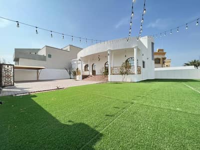 GROUND FLOOR VILLA WITH GARDEN AVAILBLE FOR RENT WITH 3 MASTER ROOM MAJLIS HALL IN RAQAIB AJMAN RENT 70,000/- YEARLY