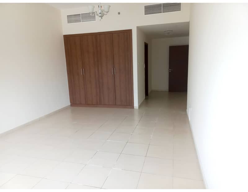 2 BHK BIG SIZE GARDEN VIEW AVAILABLE FOR SALE IN AJMAN ONE TOWERS WITH PARKING LESS PRICE.