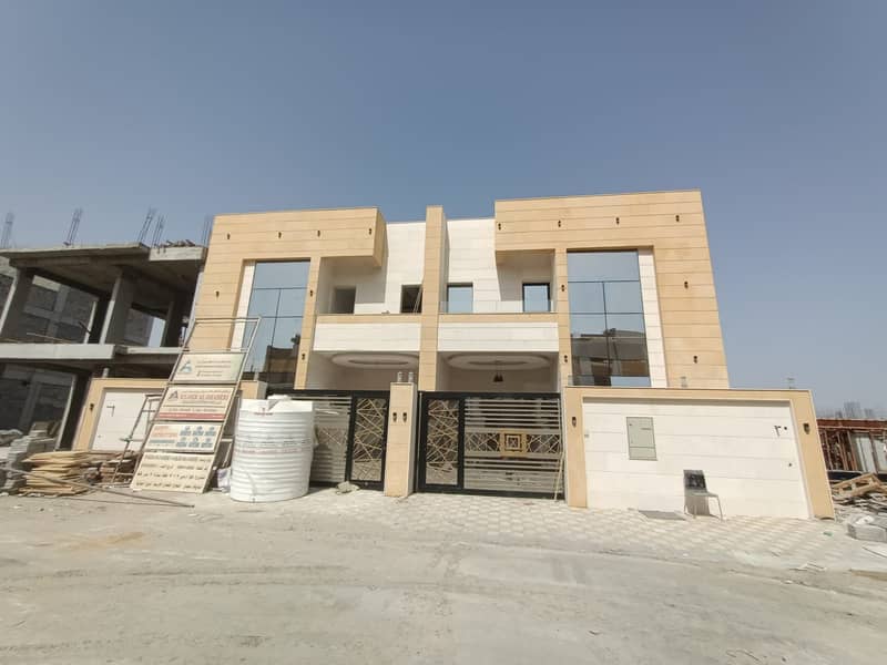 Own a modern classic design villa, ground, first and roof in the most prestigious areas in Ajman without down payment