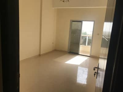 Studio for Rent in Al Rawda, Ajman - Studio large area * separate kitchen * with balcony * Excellent location on the main street