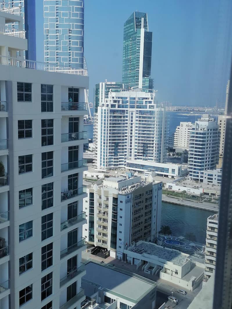 Dubai marina , 2 b/r with chiller free , 4 cheques , balcony , sheikh zayed road view & sea view