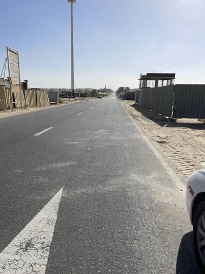 Plot for Sale in Hoshi, Sharjah - Two attached lands in Al-Hoshi, the area of ​​​​one piece is 4200 feet, location and specifications for a shot