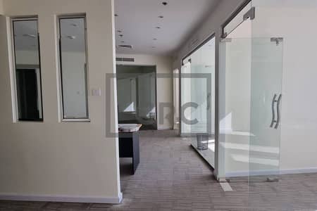 Office for Sale in Motor City, Dubai - Mid Floor Fitted Partitioned Office | Tenanted