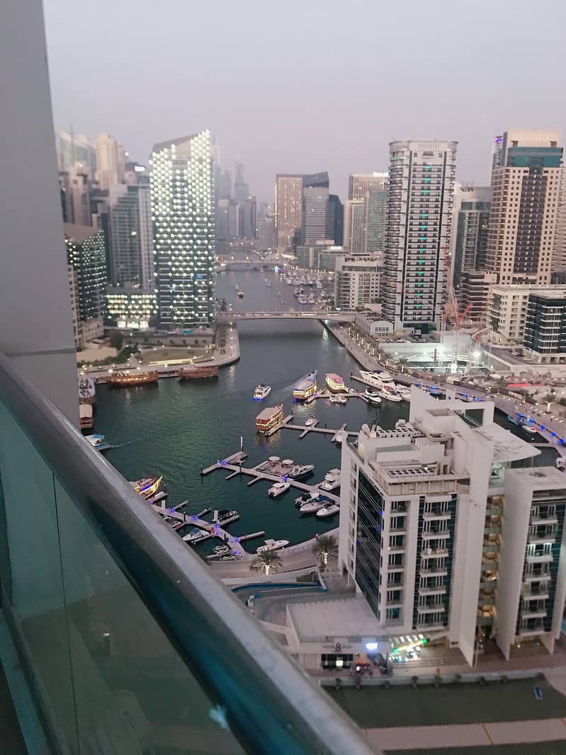 Dubai marina , 1 b/r with partial marina view , chiller free , 4 cheques , high  floor