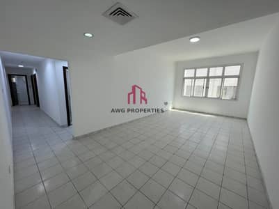 فلیٹ 2 غرفة نوم للايجار في الكرامة، دبي - شقة في بناية الكرامة بلاس الكرامة 2 غرف 60000 درهم - 5939905