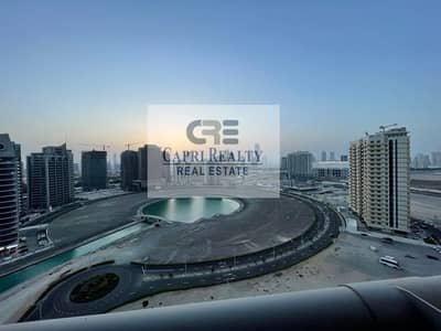 Studio for Rent in Dubai Sports City, Dubai - 0% commission- Furnished lake view - Elite 5 -High floor