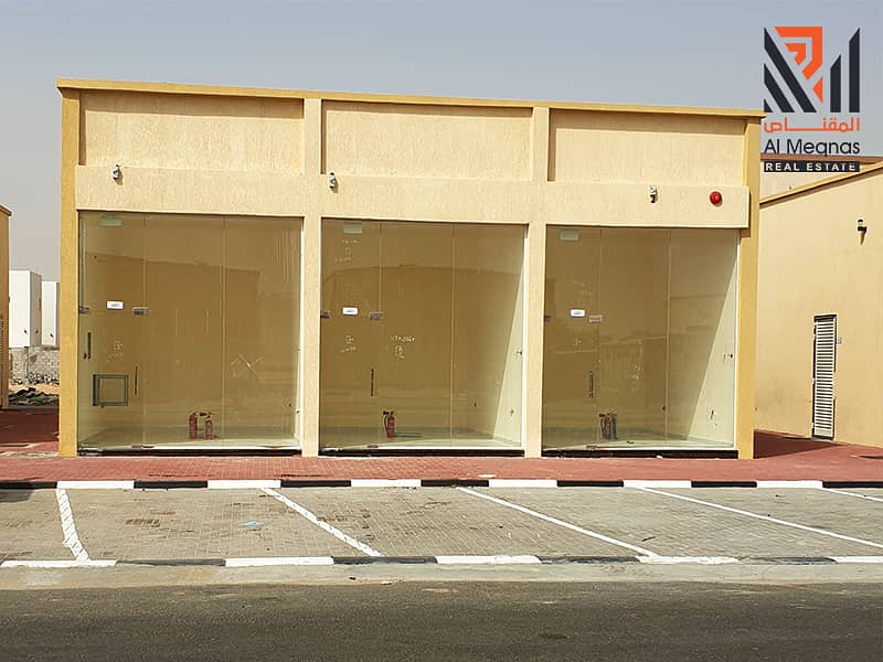 For sale a commercial residential building-shops-in Al Zahia area in Ajman-exempt from registration&ownership fees-freehold for all  nationalities