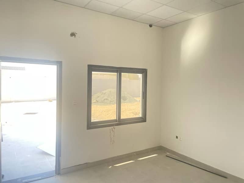 new commercial showrooms with commercial land in Al Saja’a for