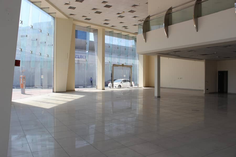 Large Corner Showroom For Rent Near DNATA high visibility