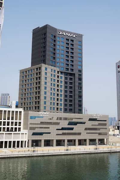 شقة فندقية 3 غرف نوم للايجار في الخليج التجاري، دبي - شقة فندقية في داماك ميزون ذا فوغ الخليج التجاري 3 غرف 200000 درهم - 5955291