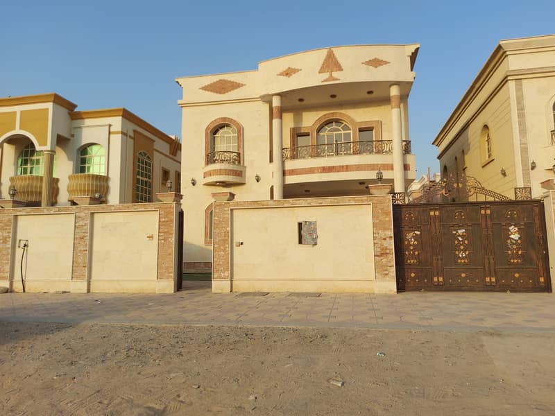 A 5000-square-foot villa for rent in Al Mowaihat, opposite the Academy, at a price of 90,000 dirhams annually.