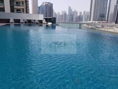2 Bedroom Apartment for Rent in Business Bay, Dubai - CANAL FACING 2BHK WITH KITCHEN EQUIPMENTS 2 BALCONIES PARKING 80K