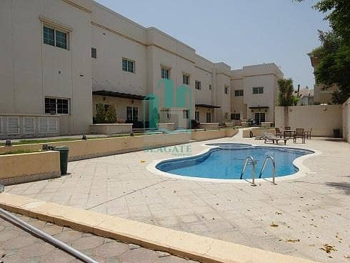 Very nice 4 bed study compound villa with shared pool in Umm Suqeim 1