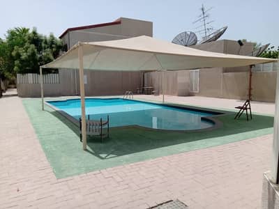 3 Bedroom Villa for Rent in Al Nuaimiya, Ajman - 3 Bedroom Hall, Living and Dining Main Road | Swimming Pool , Small Gaeden Inside Villa
