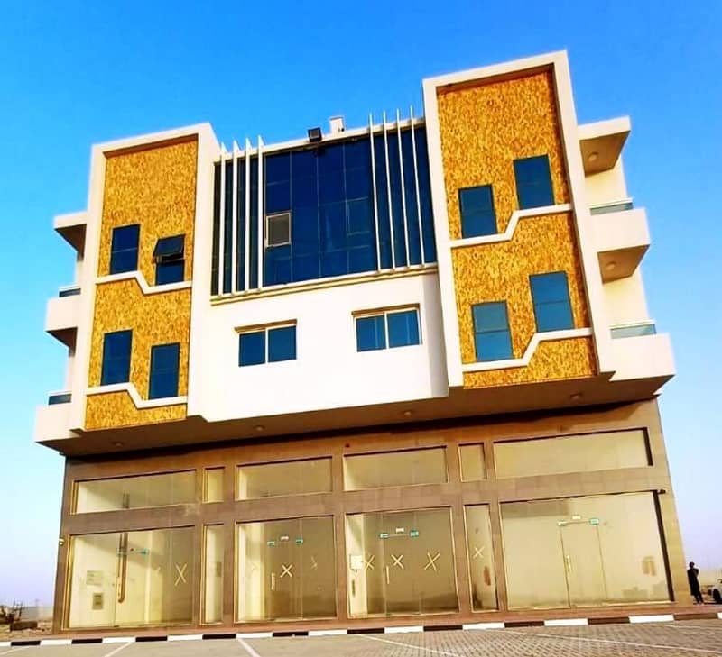 For sale a new commercial residential building in Al Jarf 2 area in Ajman