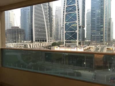 Studio for Sale in Jumeirah Lake Towers (JLT), Dubai - Rented | Balcony | Close to Metro | Parking