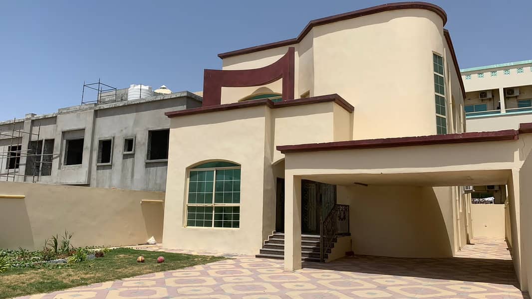 Two-storey villa for rent in Ajman, Al-Rawda area, with air conditioners, l