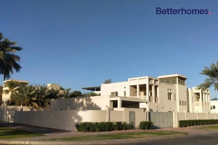 6 Bedroom Villa for Sale in Emirates Hills, Dubai - Huge Corner Plot | Lake View | Vastu Compliant