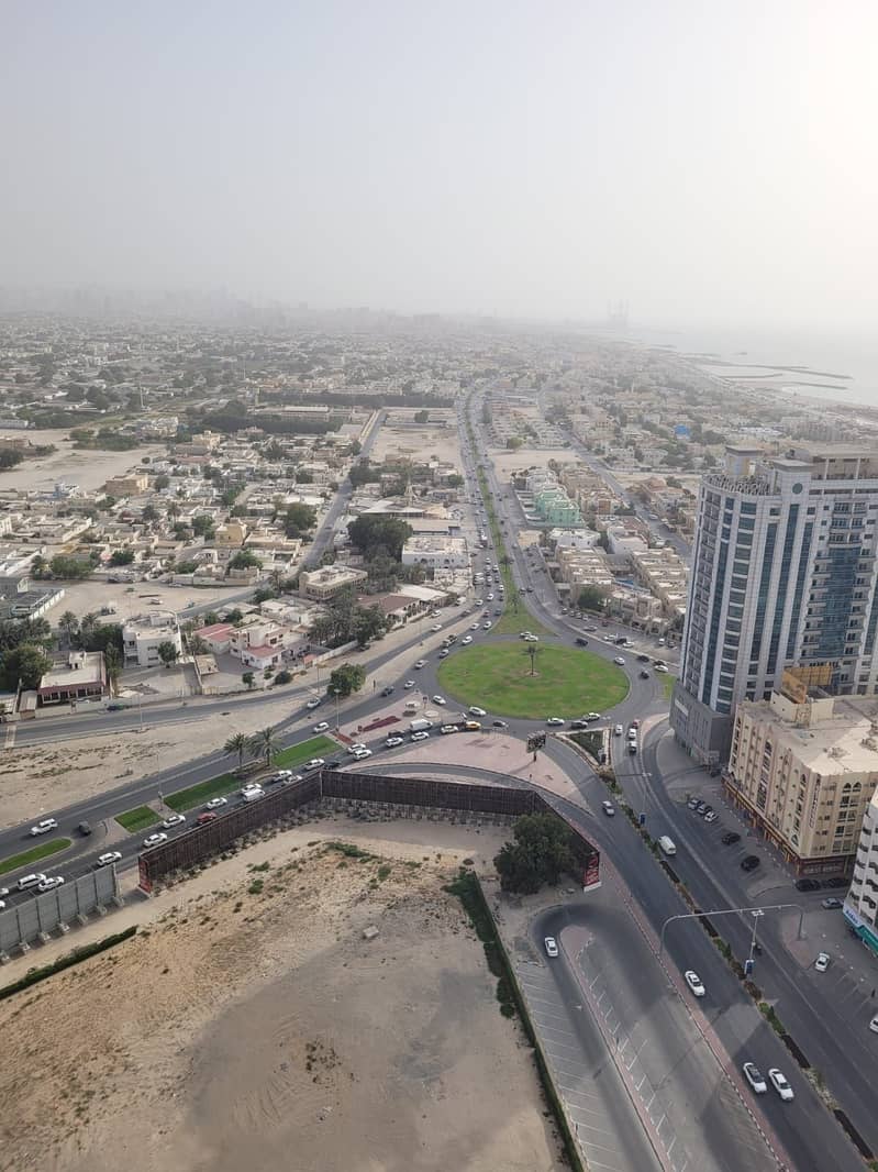TWO BEDROOM PARTIAL SEA VIEW & CITY VIEW FLAT FOR RENT AJMAN ONE TOWER WITH PARKING