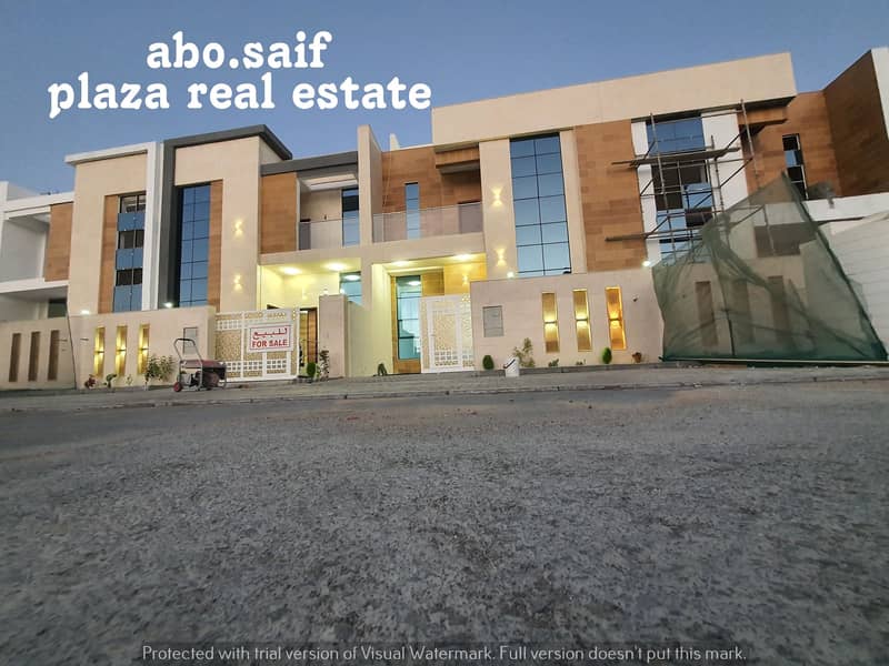 Villa for sale in Ajman, Al-Alia area, freehold, on Qar Street, ground, first, and roof, super deluxe finishing, international decor, very beautiful,