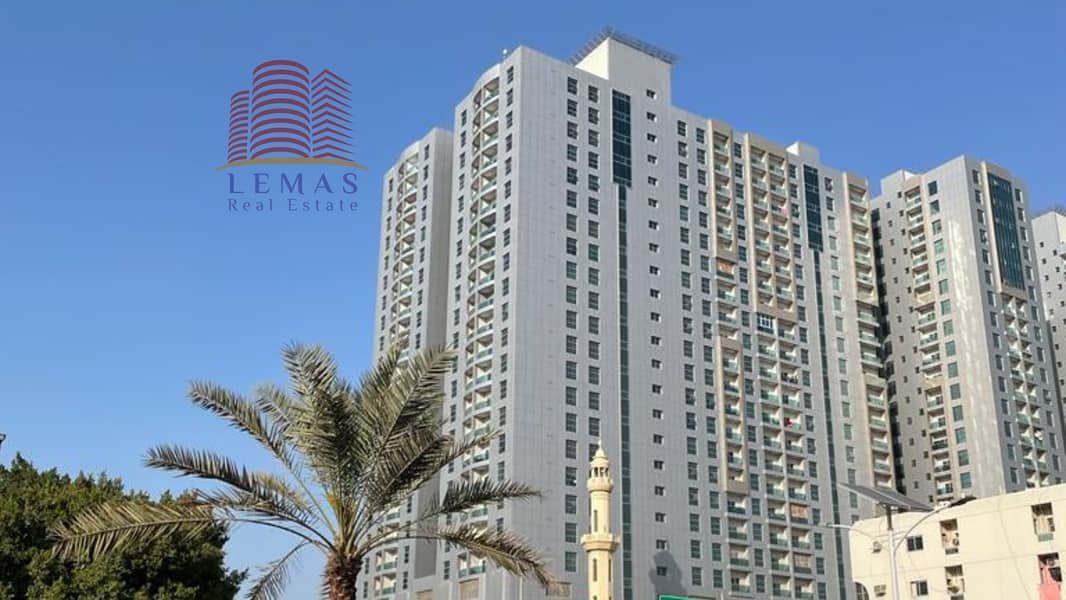 Empty 2 bhk palace view with parking and free A/C for sale in city tower ajman
