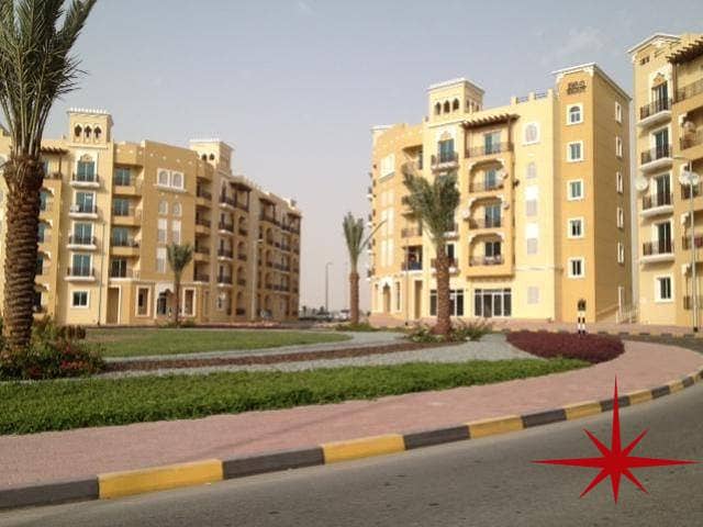 LARGE STUDIO WITH BALCONY IN EMIRATES CLUSTER BUILDING , INT'L CITY !!!