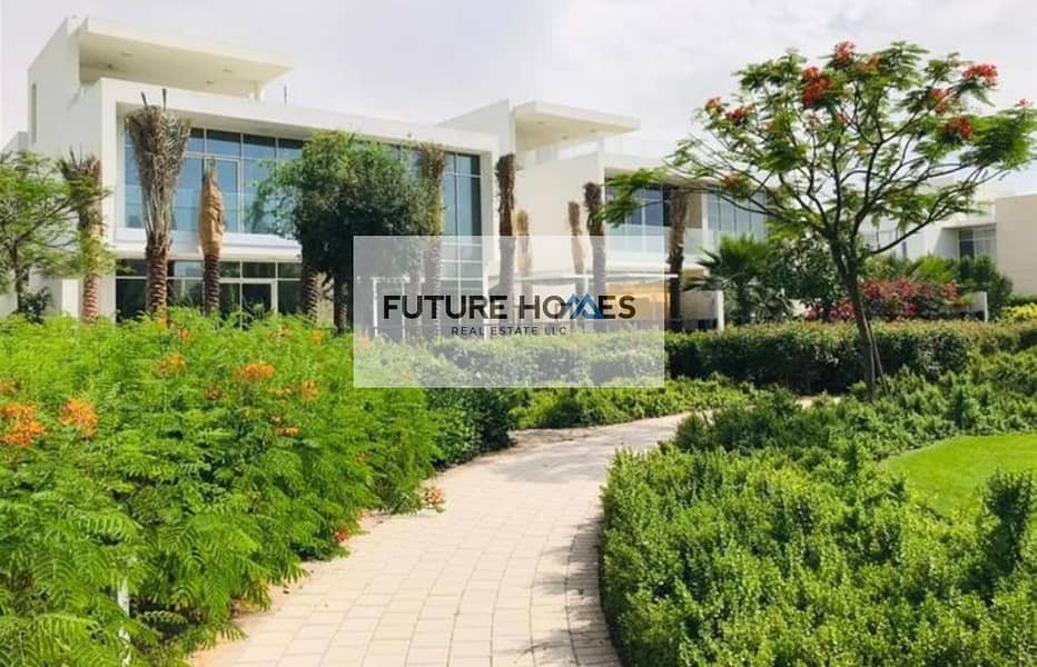 Luxurious aesthetic 4 Bedroom villa overlooking at al zorah golf course.