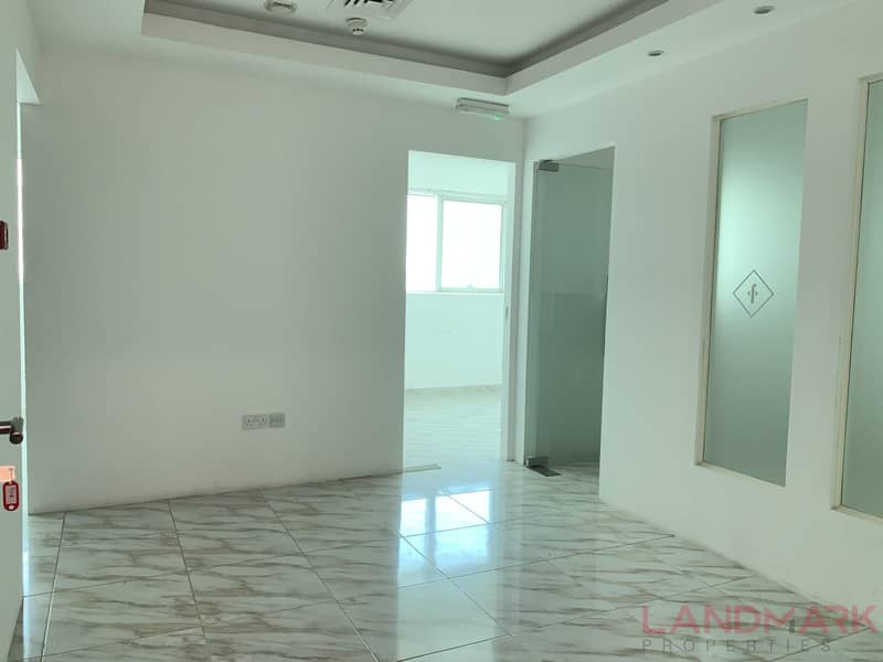 Good Deal | Spacious Fitted Office in Muhaisnah 4 | Rahaf Tower