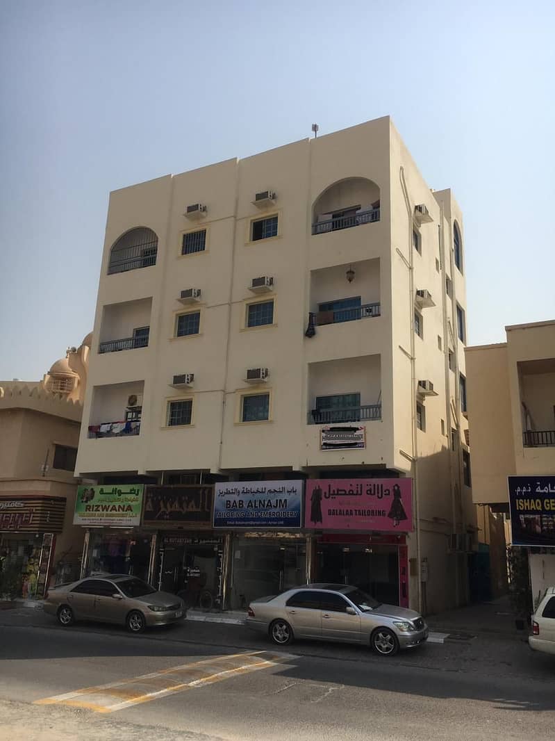 For sale a commercial building in the Al-Rumaila area, the Emirate of Ajman