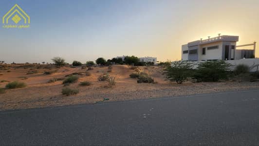 Plot for Sale in Falaj Al Mualla, Umm Al Quwain - For sale residential land with permission to build on the ground and first, with an area of ​​5,000 sq. ft. Umm Al Quwain - Falaj Al Mualla - Al Nabh