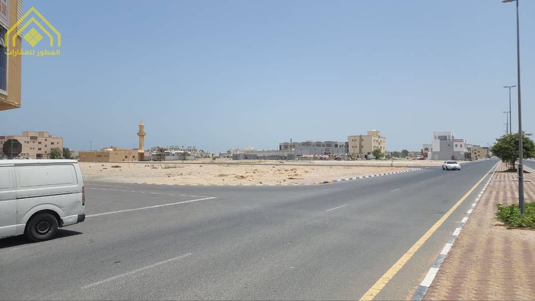 For sale residential commercial land with an area of 6,240 feet Umm Al Quwain - Al Rigga region