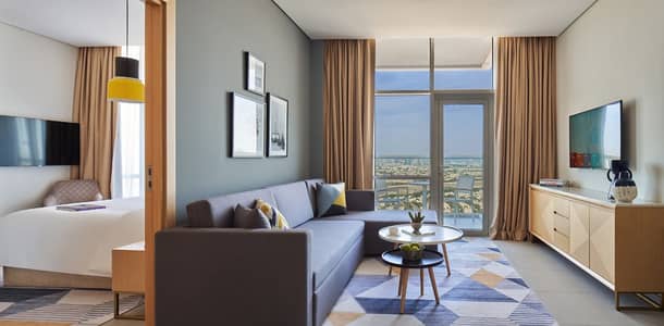 فلیٹ 1 غرفة نوم للايجار في مثلث قرية الجميرا (JVT)، دبي - شقة في فندق وأبراج ترحاب مثلث قرية الجميرا (JVT) 1 غرف 72998 درهم - 6038771