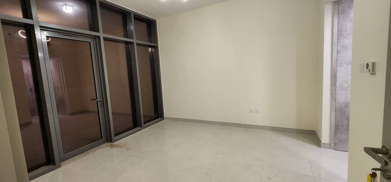 Luxurious Brand New 2 Bedroom Apartment  . 2 Month Free  Chiller Free. Kitchen appliances   Full Facilities Rent only AED 70000