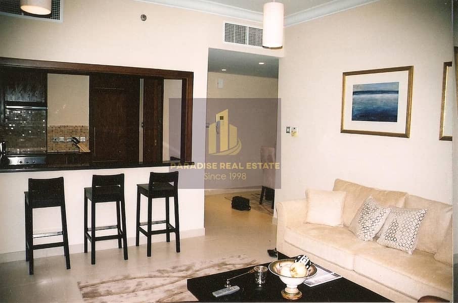 Specious 1 Bedroom+study apartment /chiller Ac free/covered parking/2 bathrooms/large balcony/higher floor/pool veiw