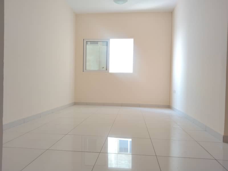 Great offer 1bhk with 1 month free Dubai Sharjah border front of the bus stop F 22 F 24
