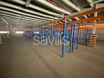 Warehouse for Rent in Jebel Ali, Dubai - Fully Racked Distribution Facility | Ready to Use