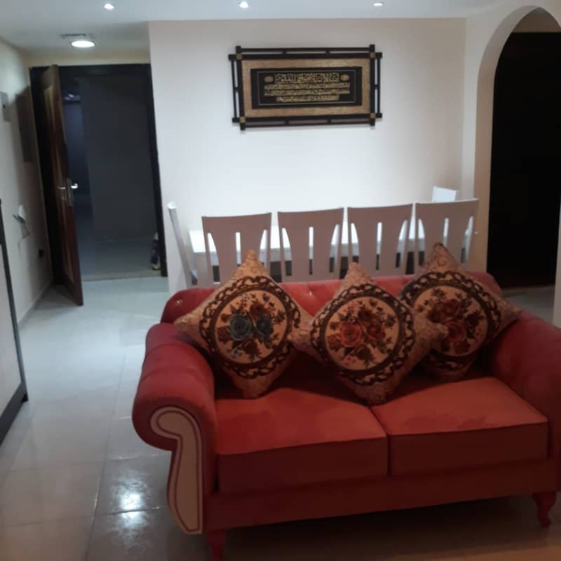 Cooperation, Sheikh Tariq building, one room and a hall, the price is 3700, including internet and sandy parking Available on 30/6