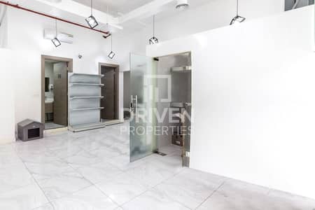 Shop for Rent in Jumeirah Village Circle (JVC), Dubai - 2 Fitted Shops Connected | Best Location