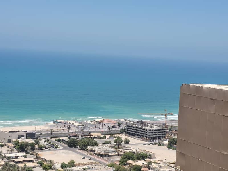 GIVE 5% GET OWN YOUR 2 BHK BIG SIZE PARTIAL SEA VIEW AVAILABLE FOR SALE IN AJMAN ONE TOWERS WITH PARKING.