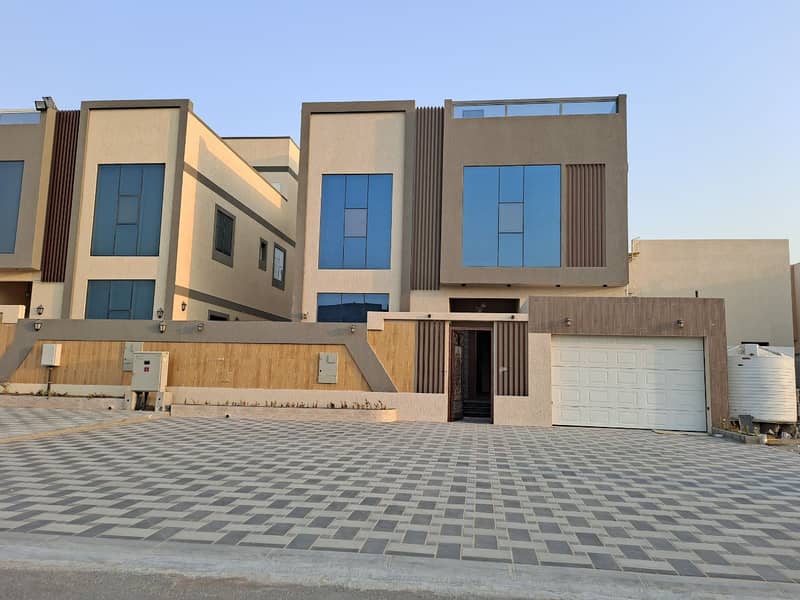 Modern design villa, three floors, opposite Sheikh Mohammed bin Zayed Street, exempt from annual fees