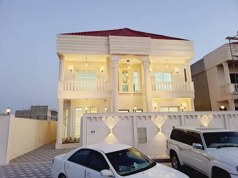 For urgent sale, without down payment, a villa on Sheikh Mohammed bin Zayed Road, in the design of Jumeirah Dubai, next to the Al Raqaib area. The vil